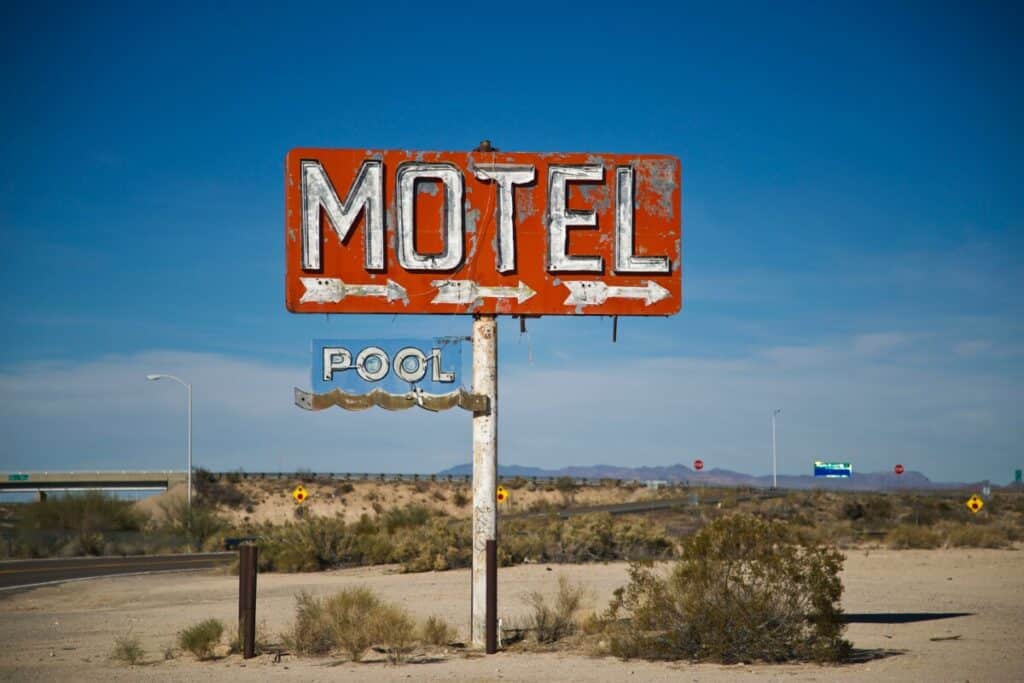 Motel sign on side of highway