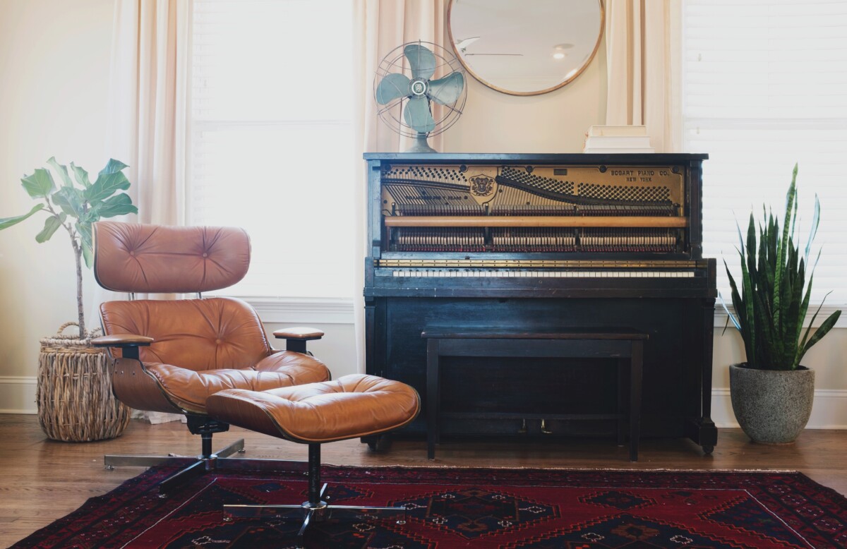 Music room with a rug and piano